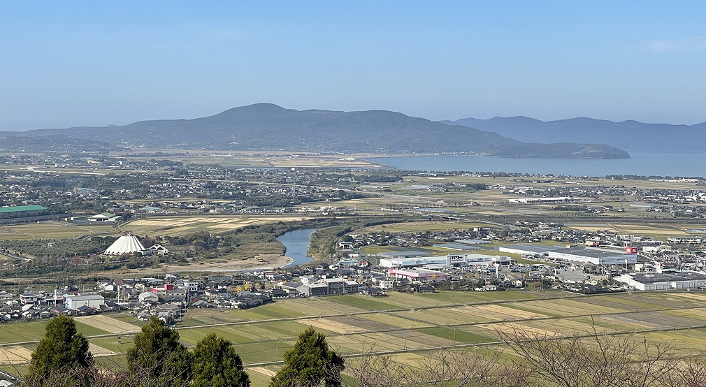 The view from Tōkō-zan looking out across the Izumi Plain with the distinctive Crane Park Museum visible in the lower left © Mark Brazil